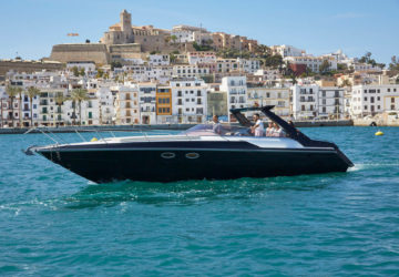 Sunseeker Tomahawk 37 cruising infront of Ibiza town